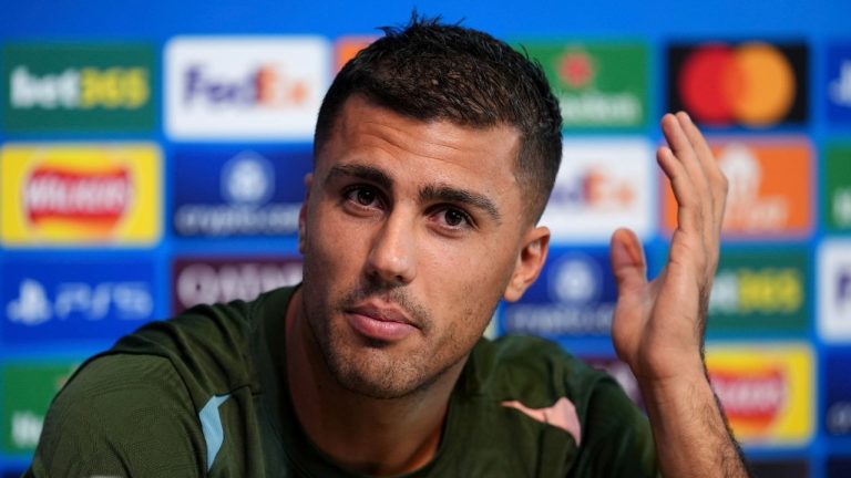 Manchester City's Rodri attends a press conference at the City Football Academy in Manchester, England, Tuesday Sept. 17, 2024. (Martin Rickett/PA via AP)