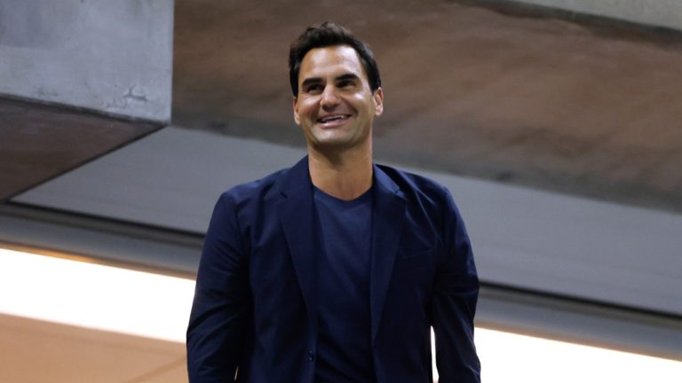 Tennis great Roger Federer acknowledges the crowd during the quarterfinal match between Aryna Sabalenka, of Belarus, and Zheng Qinwen, of China, during the U.S. Open tennis championships, Tuesday, Sept. 3, 2024, in New York. (Adam Hunger/AP)