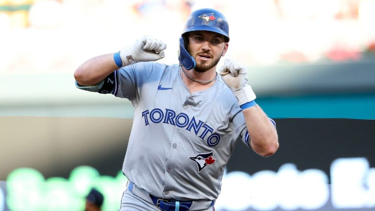 Toronto Blue Jays designated hitter Spencer Horwitz celebrates after his two-run home run while he runs the bases during the first inning of a baseball game against the Minnesota Twins, Saturday, Aug. 31, 2024, in Minneapolis. (Matt Krohn/AP)