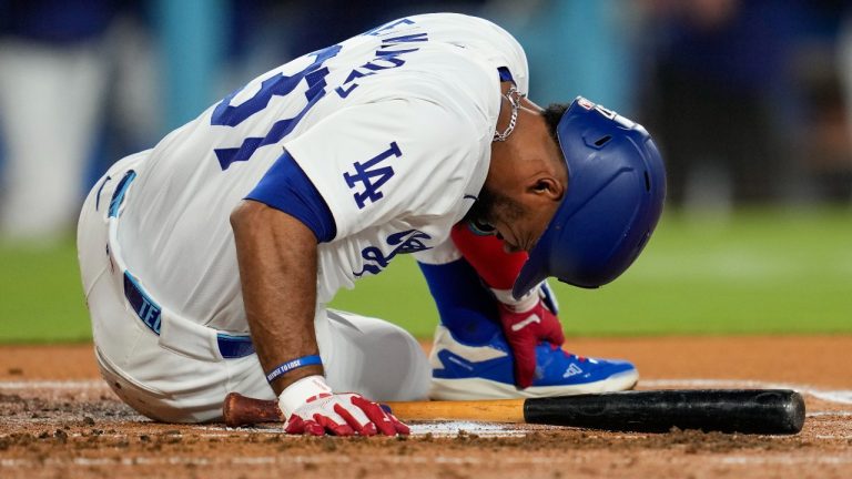 Los Angeles Dodgers' Teoscar Hernández reacts after being hit by a pitch from Cleveland Guardians starting pitcher Matthew Boyd during the first inning of a baseball game in Los Angeles, Friday, Sept. 6, 2024. (Ashley Landis/AP)