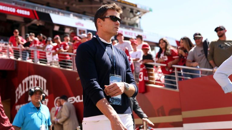 Tom Brady walks onto the file before San Francisco 49ers play New Orleans Saints beforeNFL preseason game at Levi's Stadium in Santa Clara, Calif., on Sunday, August 18, 2024./San Francisco Chronicle via AP)