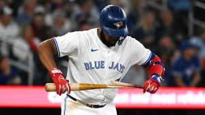 Toronto Blue Jays' Vladimir Guerrero Jr. (27) breaks his bat on a fly out in the fourth inning of an MLB baseball game against the Philadelphia Phillies in Toronto on Tuesday Sept. 3, 2024. (Jon Blacker/CP)