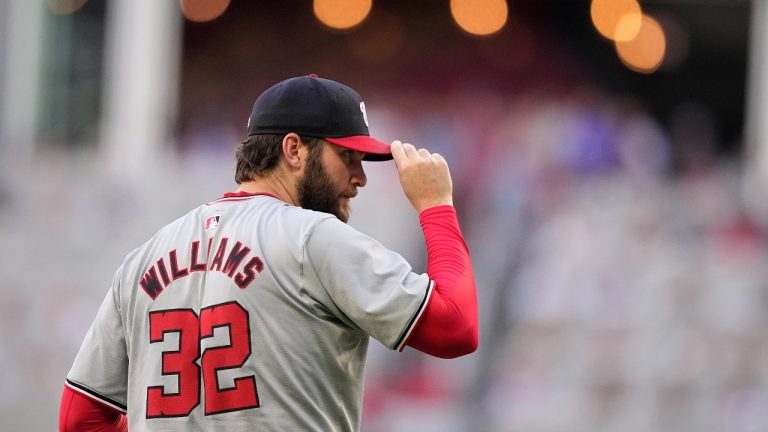 Washington Nationals pitcher Trevor Williams (32) looks before he delivers in the first inning of a baseball game against the Atlanta Braves, Thursday, May 30, 2024, in Atlanta. (AP/Brynn Anderson)