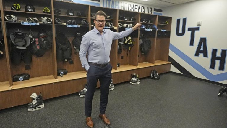 Utah Hockey Club general manager Bill Armstrong points during a tour of the new temporary practice facility locker room at the Olympic Oval Tuesday, Sept. 17, 2024, in Kearns, Utah. (Rick Bowmer/AP Photo)
