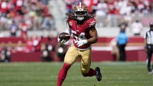 San Francisco 49ers linebacker Fred Warner returns an interception for a touchdown during the first half of an NFL football game against the New England Patriots in Santa Clara, Calif., Sunday, Sept. 29, 2024. (Godofredo A. Vásquez/AP Photo)
