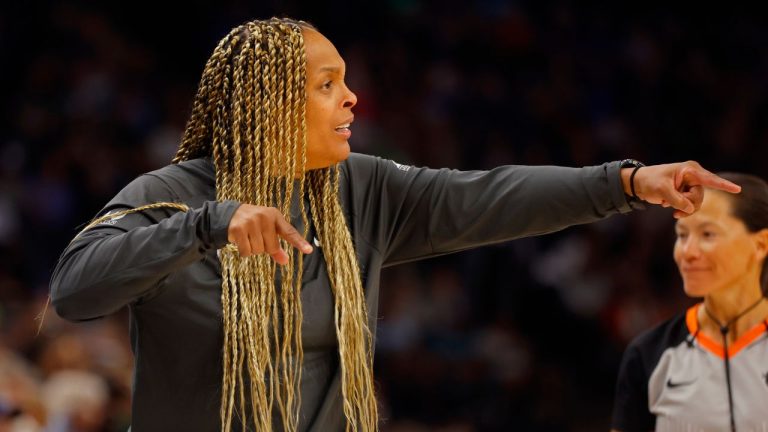 Chicago Sky head coach Teresa Weatherspoon, left, directs her team as they play the Minnesota Lynx in the second quarter of a WNBA basketball game Friday, Sept. 13, 2024, in Minneapolis. (Bruce Kluckhohn/AP Photo)