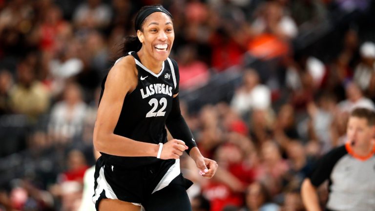 Las Vegas Aces center A'ja Wilson (22) celebrates a play against the Chicago Sky during the second half of an WNBA basketball game, Tuesday, Sept. 3, 2024, in Las Vegas. L (Steve Marcus/Las Vegas Sun via AP)