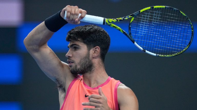 Carlos Alcaraz of Spain watches his shot during his men's singles match against Tallon Griekspoor of Netherlands in the China Open tennis tournament, at the National Tennis Center in Beijing, Sunday, Sept. 29, 2024. (Andy Wong/AP)