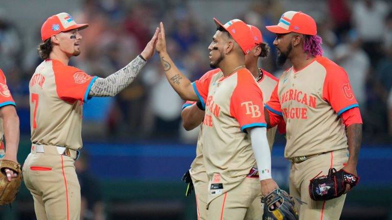 American League players celebrate at the end of the MLB All-Star baseball game, Tuesday, July 16, 2024, in Arlington, Texas. (Julio Cortez/AP Photo)