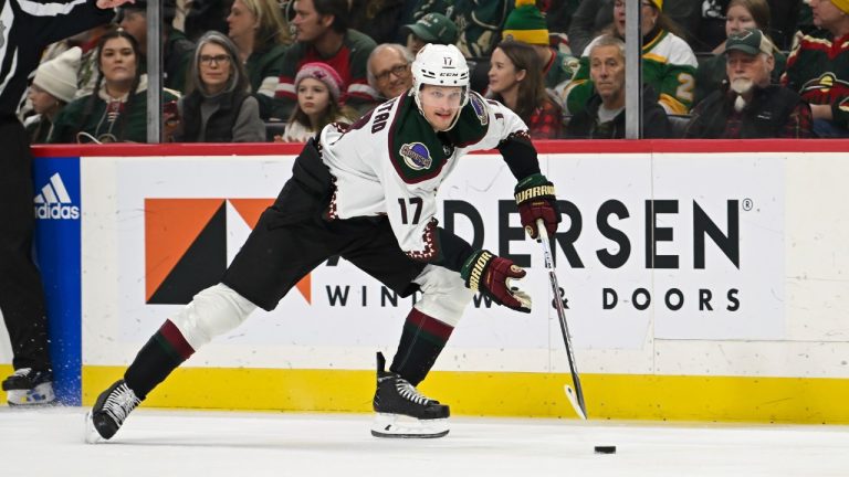 Arizona Coyotes center Nick Bjugstad skates down ice against the Minnesota Wild during the second period of an NHL hockey game Saturday, Jan. 13, 2024, in St. Paul, Minn. (Craig Lassig/AP)