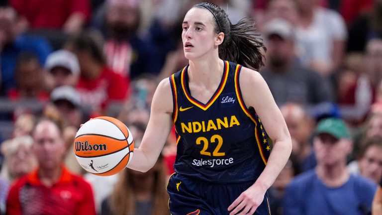 Indiana Fever guard Caitlin Clark (22) plays against the Dallas Wings in the second half of a WNBA basketball game in Indianapolis, Sunday, Sept. 15, 2024. (Michael Conroy/AP)