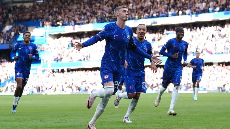 Chelsea's Cole Palmer (centre) celebrates scoring his side's second goal of the game with team-mates during a British Premier League soccer match between Chelsea and Brighton at Stamford Bridge, London, Saturday, Sept. 28, 2024. (Bradley Collyer/PA via AP)