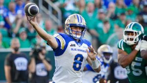 Winnipeg Blue Bombers quarterback Zach Collaros (8) throws against Saskatchewan Roughriders during the first half of CFL action in Regina, on Sunday, September 1, 2024. (Heywood Yu/THE CANADIAN PRESS)