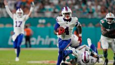 Cook scores three TDs to help Bills rout Dolphins