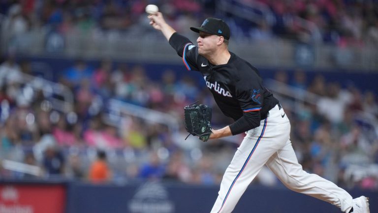 Miami Marlins' Brett de Geus delivers a pitch during the eighth inning of a baseball game against the Chicago Cubs, Friday, Aug. 23, 2024, in Miami. (Wilfredo Lee/AP Photo)