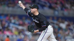 Miami Marlins' Brett de Geus delivers a pitch during the eighth inning of a baseball game against the Chicago Cubs, Friday, Aug. 23, 2024, in Miami. (Wilfredo Lee/AP)