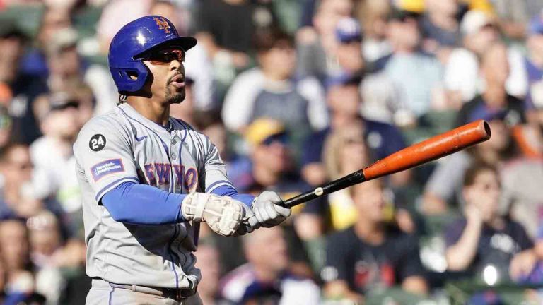 New York Mets' Francisco Lindor watches his solo home run during the sixth inning of a baseball game against the Milwaukee Brewers, Sunday, Sept. 29, 2024, in Milwaukee. (Aaron Gash/AP)