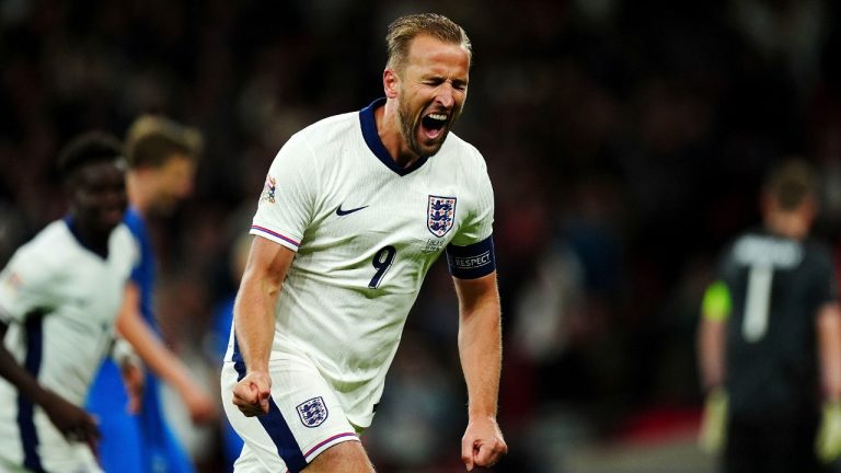 England's Harry Kane celebrates after scoring his side's opening goal.Tuesday, Sept. 10, 2024. (Mike Egerton/PA via AP)