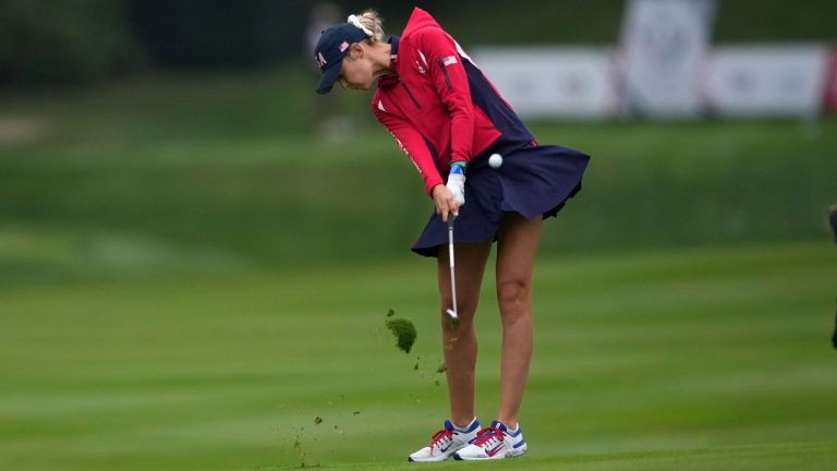 United States' Nelly Korda hits from the seventh fairway during a Solheim Cup golf tournament foursomes match at Robert Trent Jones Golf Club, Friday, Sept. 13, 2024, in Gainesville, Va. (Matt York/AP)