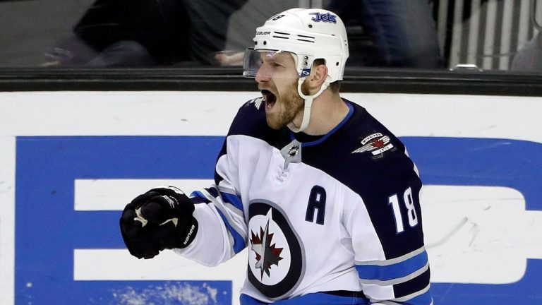 Winnipeg Jets' Bryan Little celebrates after scoring in overtime of the team's NHL hockey game against the San Jose Sharks on Tuesday, Jan. 23, 2018, in San Jose, Calif. (Marcio Jose Sanchez/AP)