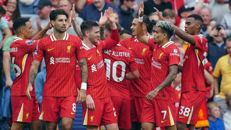 Liverpool's Luis Diaz, second right, celebrates scoring his side's second goal of the game, during the English Premier League soccer match between Liverpool and Bournemouth, at Anfield, in Liverpool, England, Saturday, Sept. 21, 2024. (Peter Byrne/PA via AP)