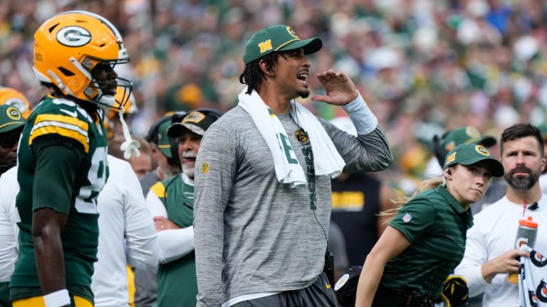 Injured Green Bay Packers quarterback Jordan Love yells to his teammates on the field during the second half of an NFL football game against the Indianapolis Colts Sunday, Sept. 15, 2024, in Green Bay, Wis. (Morry Gash/AP)