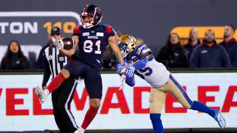 Montreal Alouettes wide receiver Austin Mack (81) makes a catch as he's tackled by Winnipeg Blue Bombers defensive back Demerio Houston (35) during the second half of football action at the 110th CFL Grey Cup in Hamilton, Ont., on Sunday, November 19, 2023. (Frank Gunn/CP)