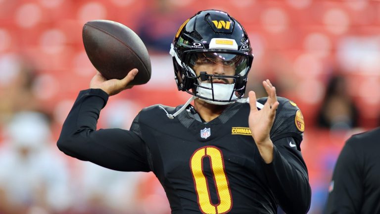 Washington Commanders quarterback Marcus Mariota (0) throws before an NFL football game against the New England Patriots, Sunday, August 25, 2024 in Landover, Md. (Daniel Kucin Jr./AP)