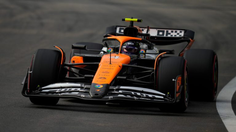 McLaren driver Lando Norris of Britain steers his car during the third practice session of the Singapore Formula One Grand Prix at the Marina Bay Street Circuit, in Singapore, Saturday, Sept. 21, 2024. (Vincent Thian/AP)