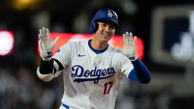 Los Angeles Dodgers designated hitter Shohei Ohtani (17) runs the bases after hitting a home run during the first inning of a baseball game against the Chicago Cubs in Los Angeles, Wednesday, Sept. 11, 2024. (Ashley Landis/AP Photo)