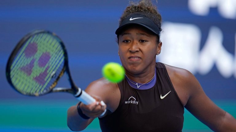 Japan's Naomi Osaka returns a shot against Italy's Lucia Bronzetti during China Open tennis tournament in Beijing, Wednesday, Sept. 25, 2024. (Ng Han Guan/AP)