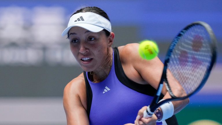 Jessica Pegula of the United States returns a backhand shot to Veronika Kudermetova of Russia during their women's singles match of the China Open tennis tournament. (Andy Wong/AP)