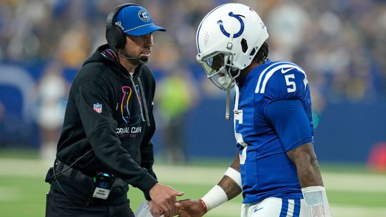 Indianapolis Colts quarterback Anthony Richardson (5) is met by head coach Shane Steichen after being injured during the first half of an NFL football game against the Pittsburgh Steelers. (Darron Cummings/AP)