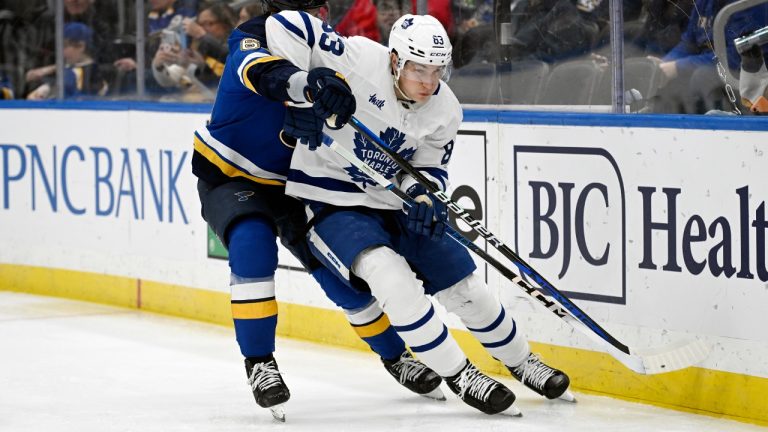 Toronto Maple Leafs' Marshall Rifai (83) works the puck against St. Louis Blues' Jake Neighbours (63) during the second period of an NHL hockey game Monday, Feb. 19, 2024, in St. Louis. (Michael Thomas/AP)