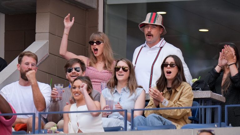 Taylor Swift and Kansas City Chiefs tight end Travis Kelce, watch play between Jannik Sinner, of Italy, and Taylor Fritz, of the United States, during the men's singles final of the U.S. Open tennis championships, Sunday, Sept. 8, 2024, in New York. (Seth Wenig/AP)