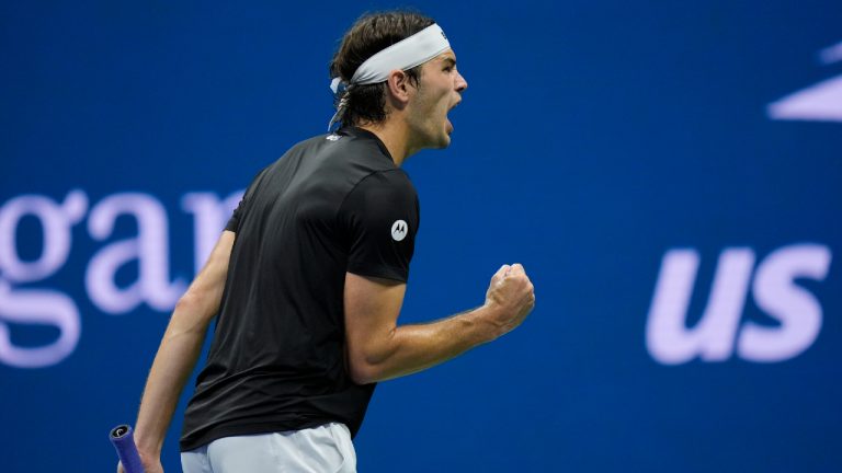 Taylor Fritz, of the United States, reacts against Frances Tiafoe, of the United States, during the men's singles semifinals of the U.S. Open tennis championships, Friday, Sept. 6, 2024, in New York. (Seth Wenig/AP)