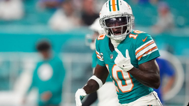 Miami Dolphins wide receiver Tyreek Hill (10) warms up before an NFL football game against the Buffalo Bills, Thursday, Sept. 12, 2024, in Miami Gardens, Fla. (Rebecca Blackwell/AP)