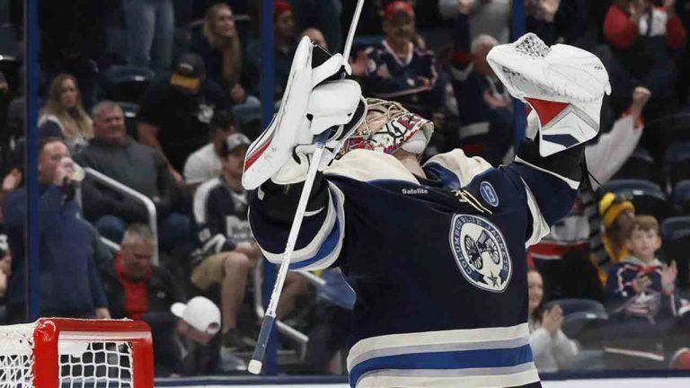 Columbus Blue Jackets' Elvis Merzlikins celebrates his shut-out win against the New York Islanders following an NHL hockey game Wednesday, Oct. 30, 2024, in Columbus, Ohio. (Jay LaPrete/AP)