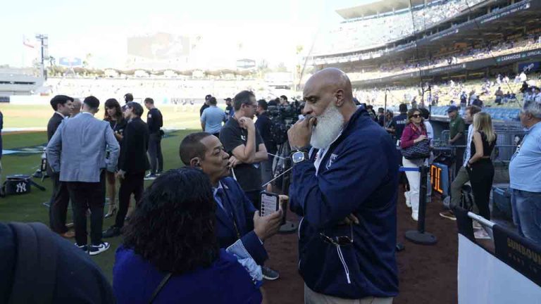 Tony Clark, right, Executive director of the Major League Baseball Players Association, talks with reporters before Game 1 of the baseball World Series, Friday, Oct. 25, 2024, in Los Angeles. (Godofredo A. Vásquez/AP)