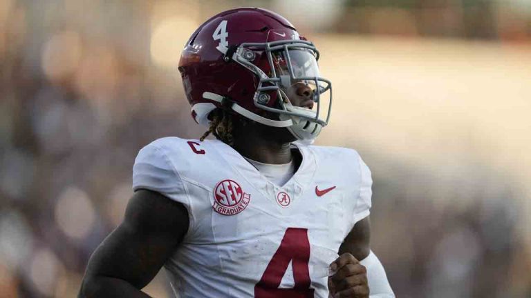 Alabama quarterback Jalen Milroe (4) jogs to the huddle during the second half of an NCAA college football game against Vanderbilt, Saturday, Oct. 5, 2024, in Nashville, Tenn. (George Walker IV/AP)