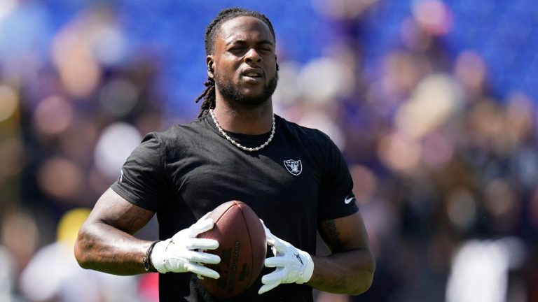 Las Vegas Raiders wide receiver Davante Adams (17) warms up before an NFL football game against the Baltimore Ravens, Sunday, Sept. 15, 2024, in Baltimore. (Stephanie Scarbrough/AP Photo)