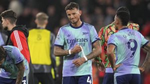 Arsenal's Ben White, centre, reacts disappointed after the English Premier League soccer match between Bournemouth and Arsenal. (Kin Cheung/AP)