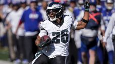 Barkley rushes for 176 yards and a TD in a return as Eagles smash Giants