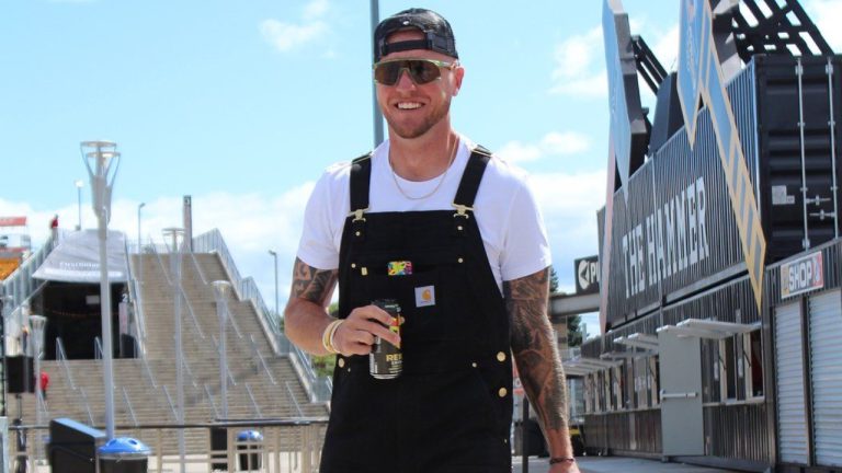 Hamilton Tiger-Cats quarterback Bo Levi Mitchell wears overalls to a game in Hamilton on September 2, 2024. (CP/HO Caleigh Alvarez, Hamilton Tiger-Cats)