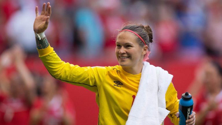 Canada goalkeeper Erin McLeod waves to fans after defeating Switzerland 1-0 during the FIFA Women's World Cup round of 16 soccer action in Vancouver, B.C., on Sunday, June 21, 2015. (Darryl Dyck/CP)