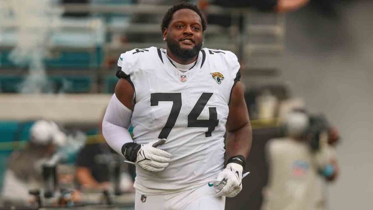 Jacksonville Jaguars offensive tackle Cam Robinson (74) runs onto the field for an NFL football game against the Cleveland Browns, Sunday, Sept. 15, 2024, in Jacksonville, Fla. (Gary McCullough/AP)