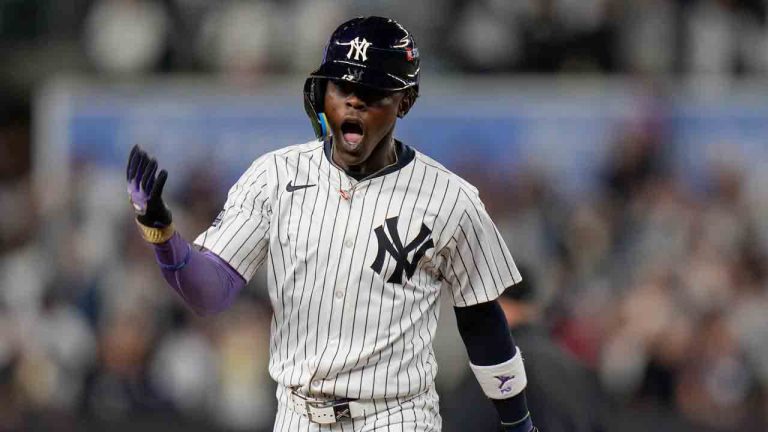 New York Yankees' Jazz Chisholm Jr. (13) reacts after hitting a solo home run against the Kansas City Royals during the ninth inning of Game 2 of the American League baseball playoff series, Monday, Oct. 7, 2024, in New York. (Seth Wenig/AP)