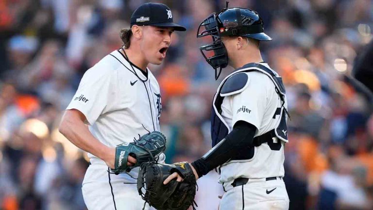 Detroit Tigers pitcher Tyler Holton, left, celebrates with teammate catcher Jake Rogers at the end of Game 3 of a baseball American League Division Series against the Cleveland Guardians, Wednesday, Oct. 9, 2024, in Detroit. The Tigers won 3-0. (Carlos Osorio/AP)