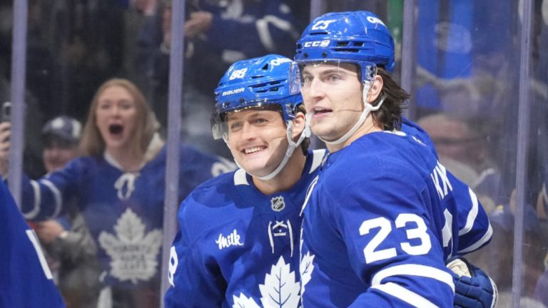 Toronto Maple Leafs' William Nylander (centre) celebrates with Matthew Knies (23) and Max Domi after scoring against the Pittsburgh Penguins during second period NHL hockey action in Toronto, on Saturday, October 12, 2024.(Chris Young/CP)