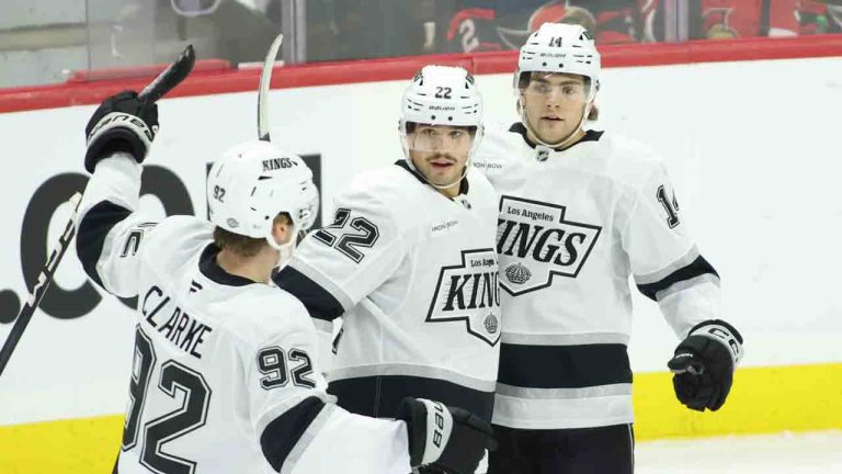 Los Angeles Kings' Kevin Fiala (22) celebrates his goal with teammates Brandt Clarke (92) and Alex Laferriere (14) during first period NHL hockey action against the Ottawa Senators in Ottawa on Monday, Oct. 14, 2024. (Patrick Doyle/CP)